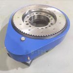 Helical gear slewing drive solutions with large gear ratio reducers