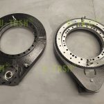 Two-stage slewing drive with extended center distance and high precision