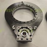 Two-stage slewing drive with extended center distance and high precision